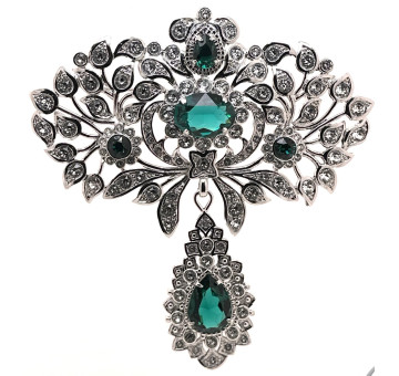 Broche esmeralda
