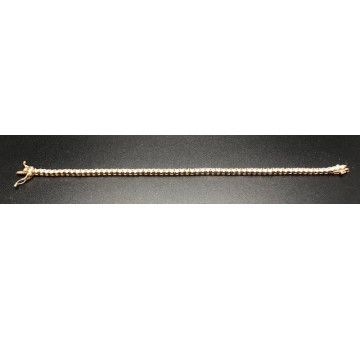 Pulsera fina dorada con circonitas redondas