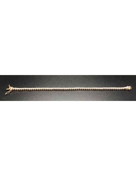Pulsera fina dorada con circonitas redondas